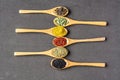 Spices on wooden spoons