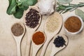 Spices on wooden spoons