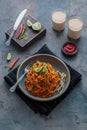 Spicy asian mee goreng mamak with eggs, ketchup and chili, top view Royalty Free Stock Photo