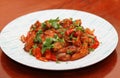 Spicy Babycorn Manchurian with tomato sauce and mixed with Capsicum, Coriander leaf