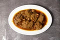 Spicy Beef Bhuna korma karahi masala served in dish isolated on background top view of bangladesh food
