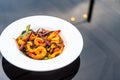 spicy black spaghetti with shrimps (tom yum kung