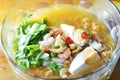 Spicy boiled instant noodle topping salty egg and dried shrimp on bowl Royalty Free Stock Photo