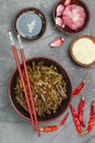 Spicy bracken  fern salad with onion, garlic, chili pepper, soy sauce, sesame seeds and spices Royalty Free Stock Photo