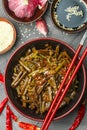 Spicy bracken  fern salad with onion, garlic, chili pepper, soy sauce, sesame seeds and spices Royalty Free Stock Photo