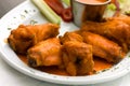 Spicy Buffalo Wings with Blue Cheese Dip Celery an Royalty Free Stock Photo