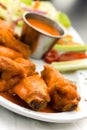 Spicy Buffalo Wings with Blue Cheese Dip Celery an Royalty Free Stock Photo