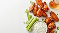 Spicy buffalo wings with blue cheese dip and celery on a white background Royalty Free Stock Photo