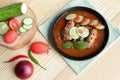 Spicy canned sardine salad on wooden background. Royalty Free Stock Photo