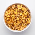 Spicy Chana Jor Garam on a white Ceramic bowl, made with air-fried Bengal Chickpea. Pile of Indian spicy snacks Namkeen,