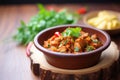 spicy chana masala dish on a wooden tabletop