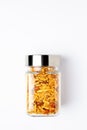 Spicy Chatpata Mixture in a glass jar with closed lid, made with peanuts, corn flakes.