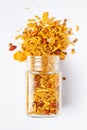 Spicy Chatpata Mixture spilled out and in a glass jar, made with peanuts, corn flakes. Royalty Free Stock Photo