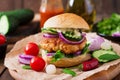 Spicy chicken burgers with tomato and eggplant - sandwich.