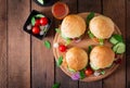 Spicy chicken burgers with tomato and eggplant - sandwich.