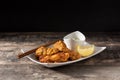 Spicy chicken karaage on wooden table