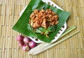 Spicy chicken ligament salad on banana leaf Royalty Free Stock Photo