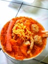 spicy chicken noodle with chicken claw topping. in East Java, Indonesia. taken at a high angle Royalty Free Stock Photo