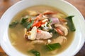 Spicy Chicken Soup - Chicken Tom Yum Spicy Thai food on white bowl Royalty Free Stock Photo