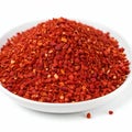 spicy chili red pepper flakes, chopped, milled dry paprika pile on white Royalty Free Stock Photo