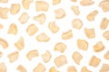 Spicy chips flakes on white background, pattern, top view.