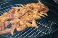 Spicy cooking chicken wings grilling on a summer barbecue Royalty Free Stock Photo