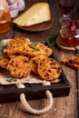 Spicy crispy cookies with cheese, sun dried tomatoes and thyme