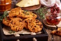 Spicy crispy cookies with cheese, sun dried tomatoes and thyme