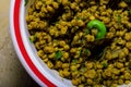 Spicy dry yellow peas in a pot