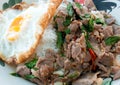 Spicy fried beef and basil leave with fried egg Royalty Free Stock Photo