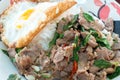 Spicy fried beef and basil leave with fried egg Royalty Free Stock Photo