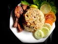 Spicy fried rice with chicken and salad  homemade Royalty Free Stock Photo