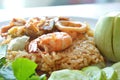 Spicy fried rice seafood and pork with eggplant in shrimp paste sauce on dish Royalty Free Stock Photo