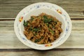 Spicy fried and stirred minced pork with holy basil and chilly.