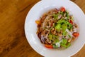 Spicy Glass Noodle Salad mixed herbs with minced pork in chili sauce. Asian spicy food menu. Royalty Free Stock Photo