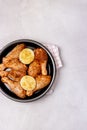 Spicy Glazed Chicken Legs on Black Plate Ready to Cook Homemade Food Concept for a Tasty and Healthy Dish. Gray Background Top Royalty Free Stock Photo