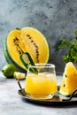 Spicy golden watermelon margarita cocktail with jalapeno and lime. Royalty Free Stock Photo