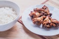 Spicy grilled chicken wings black pepper with thai rice Royalty Free Stock Photo