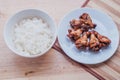 Spicy grilled chicken wings black pepper with thai rice Royalty Free Stock Photo