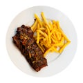 Spicy grilled veal tenderloin with French fries