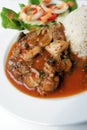 Spicy herb chicken and mushroom serve with rice