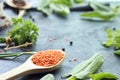 Spicy herbs, asparagus, lemons, seasonings, lentils on the kitchen table