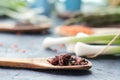 Spicy herbs, asparagus, lemons, seasonings, lentils on the kitchen table