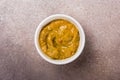 Spicy homemade mustard sauce in white bowl Royalty Free Stock Photo