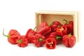 Spicy hot red habanero peppers in a wooden box Royalty Free Stock Photo