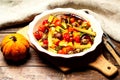 Spicy hot vegetables, cooked on an grill in ceramic bowl on wooden background. The concept of healthy eating and delicious food. Royalty Free Stock Photo