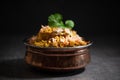 Spicy Indian biryani pulao in golden bowl with India basmati rice dish with chicken meat curry Royalty Free Stock Photo