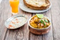 Spicy Indian biryani pulao in golden bowl with India basmati rice dish with chicken meat curry Royalty Free Stock Photo