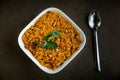 Spicy indian vegan/vegetarian food - tamarind flavored rice - Indian home cooked food with copy space