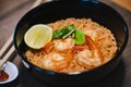 Spicy instant thai style noodles soup with shrimp tom yum kung Royalty Free Stock Photo